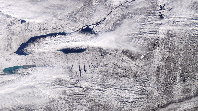 Bands of lake effect snow streaming off the Great Lakes on Dec. 26. Image: CIMSS